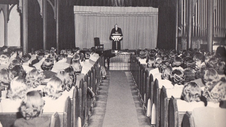 Image of students during a service being held in the marvin chapel at dean college.