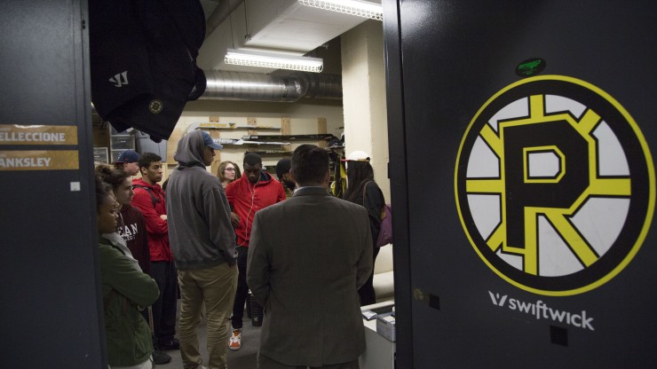 Students inside the Dunkin Donuts Center, home of the Providence Bruins.  