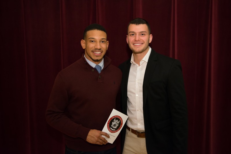 image of two students smiling during National Society for Leadership & Success Induction Ceremony